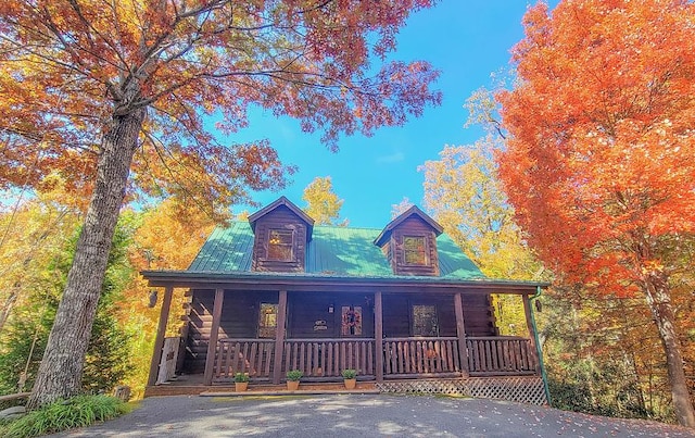 cabin with covered porch