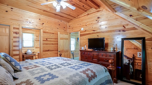 bedroom with vaulted ceiling with beams, ceiling fan, wood walls, and wooden ceiling