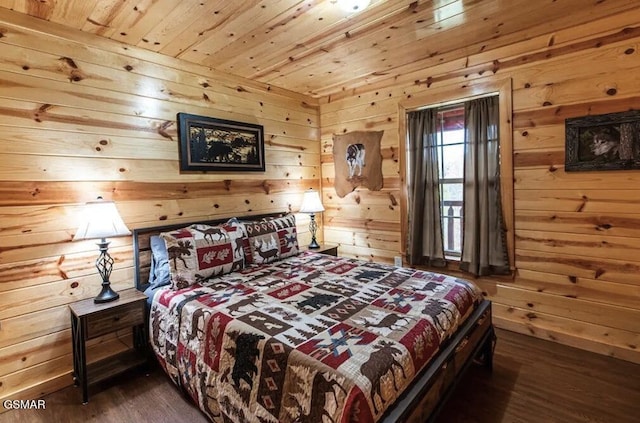 bedroom with wood finished floors, wooden walls, and wooden ceiling