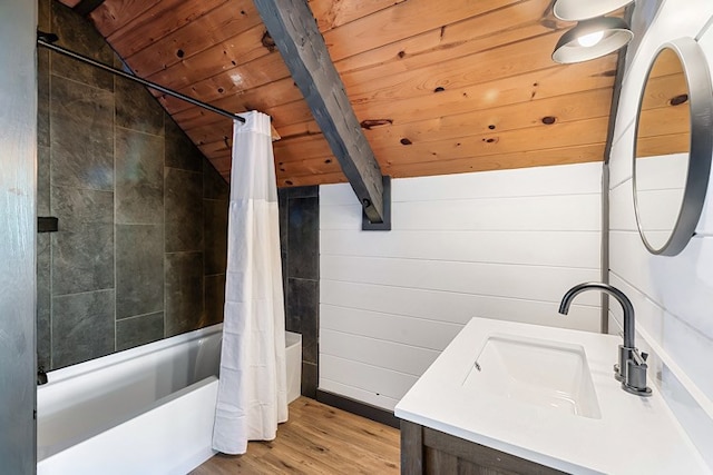 bathroom with vaulted ceiling with beams, wooden ceiling, and wooden walls