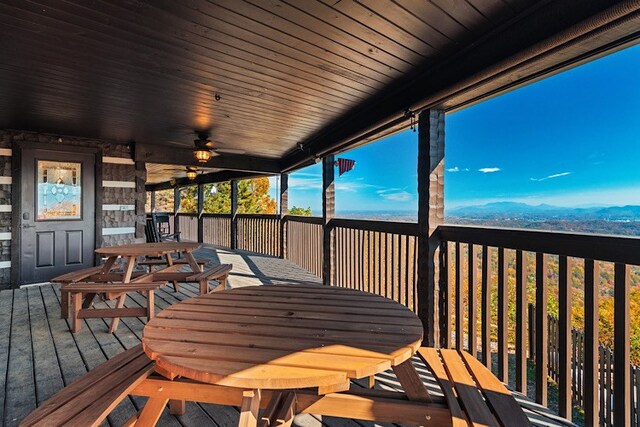 wooden terrace with ceiling fan