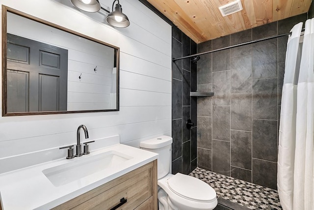 bathroom featuring vanity, wooden ceiling, a shower with curtain, wooden walls, and toilet