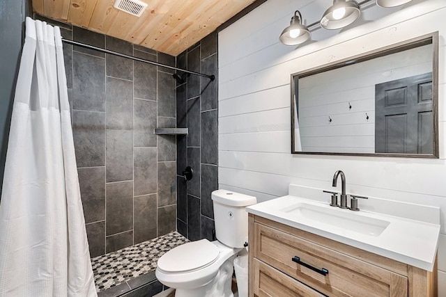 bathroom with vanity, wood walls, wooden ceiling, toilet, and curtained shower