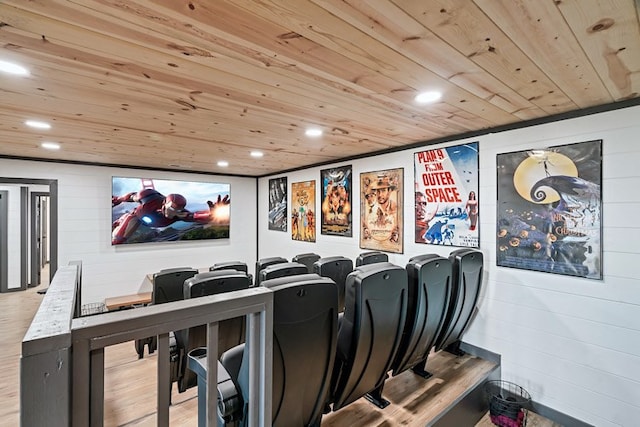 home theater featuring wooden ceiling and wood walls