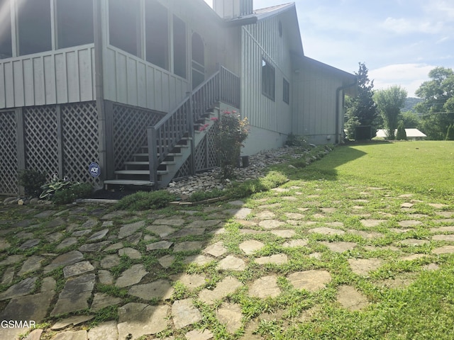 2257 Shinbone Rd, Sevierville, TN 37876 - view of side of property featuring crawl space, a lawn, and stairway