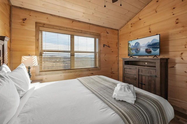 bedroom with wood walls, wood ceiling, and vaulted ceiling