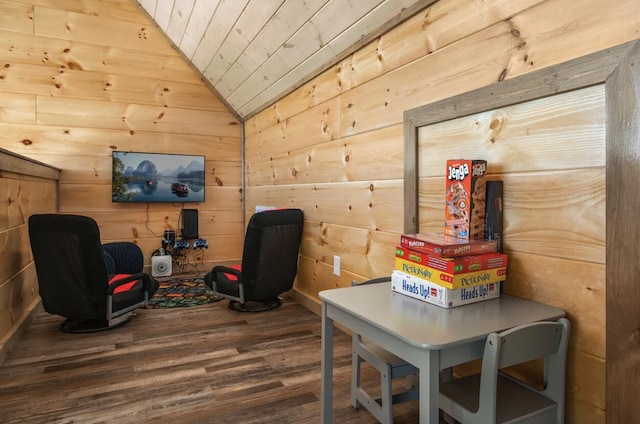 recreation room with wooden walls, wood ceiling, lofted ceiling, and wood finished floors