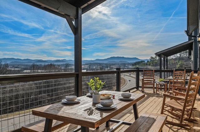 balcony featuring a mountain view