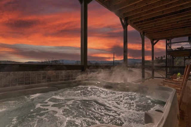 exterior space featuring a hot tub