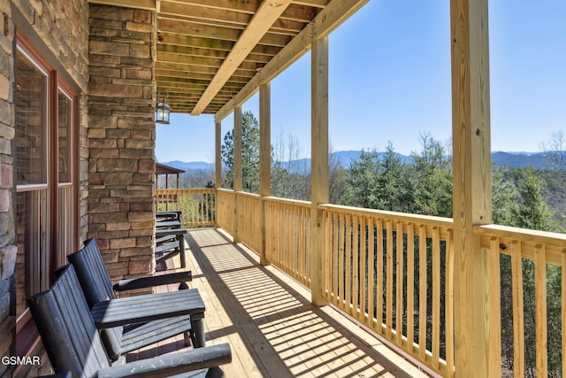 balcony featuring a mountain view