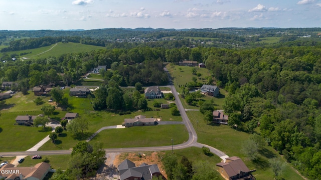 aerial view featuring a forest view