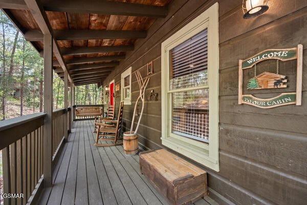 deck with covered porch