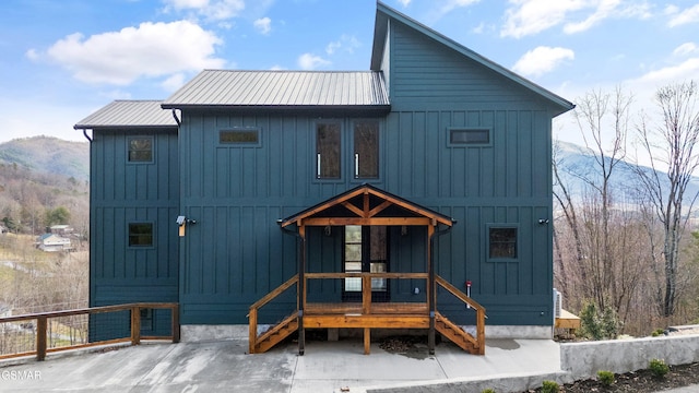 3540 Mountain Tyme Way, Sevierville, TN 37862 - modern farmhouse style home with a mountain view, board and batten siding, and metal roof