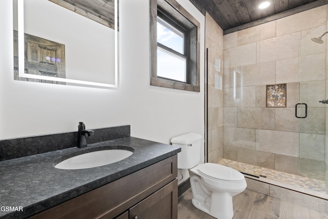 3540 Mountain Tyme Way, Sevierville, TN 37862 - full bath featuring vanity, a stall shower, toilet, and wood finished floors