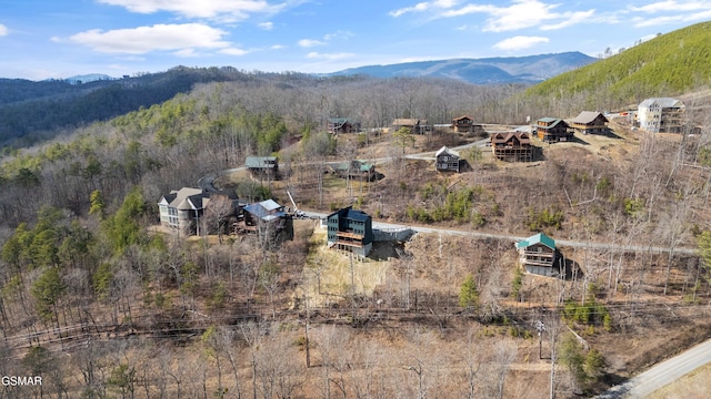 3540 Mountain Tyme Way, Sevierville, TN 37862 - aerial view of property and surrounding area with a mountain backdrop and a heavily wooded area