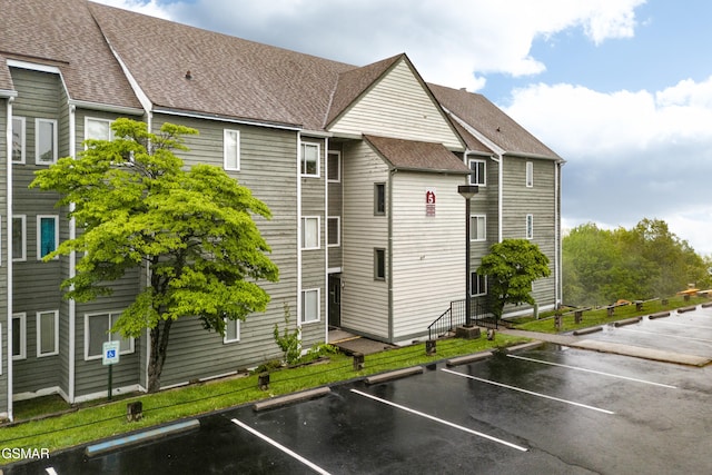 1260 Ski View Dr Unit 5106, Gatlinburg, TN 37738 - view of building exterior with uncovered parking