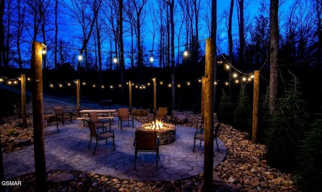 view of patio with a fire pit