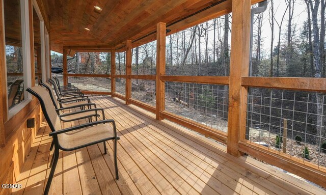 sunroom / solarium with wood ceiling