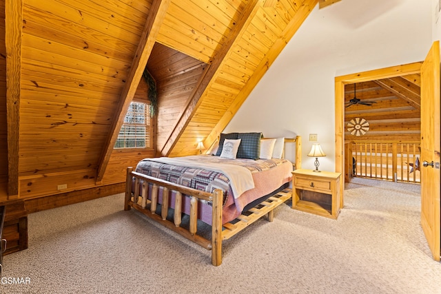 bedroom with wooden walls, carpet, wooden ceiling, and vaulted ceiling with beams