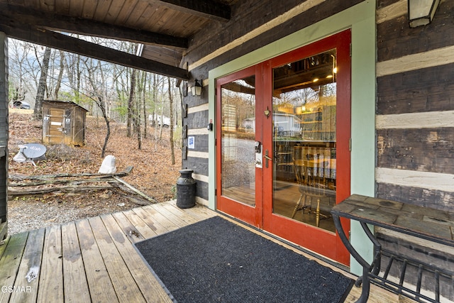 wooden terrace featuring french doors