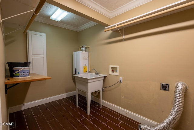 laundry area with crown molding, hookup for a washing machine, water heater, a textured ceiling, and hookup for an electric dryer