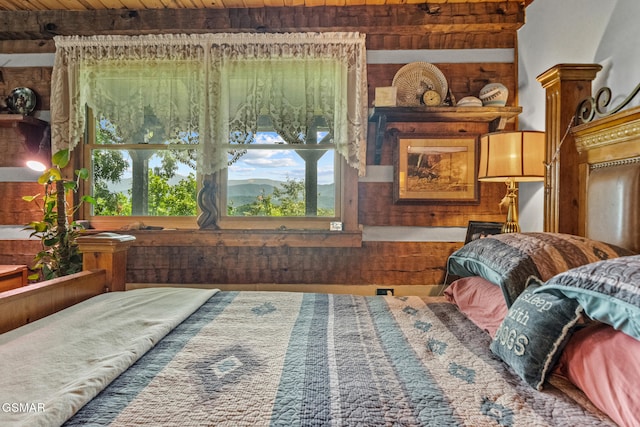 4091 Camp Hollow Rd, Sevierville, TN 37876 - bedroom featuring multiple windows and a wooden ceiling with exposed beams