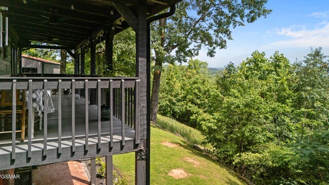 4091 Camp Hollow Rd, Sevierville, TN 37876 - view of yard with a ceiling fan and a wooden deck
