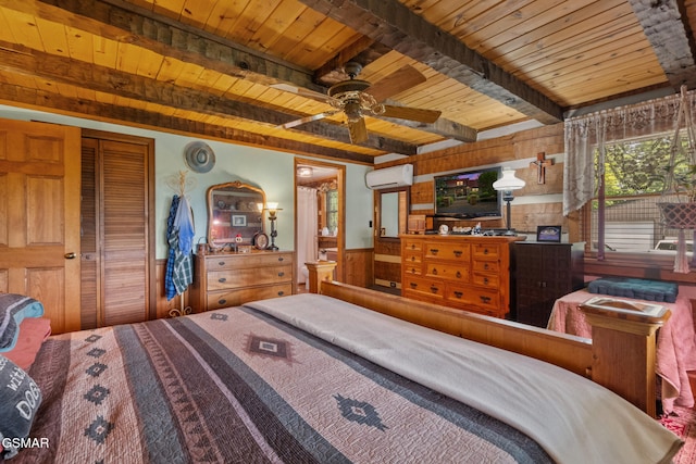 4091 Camp Hollow Rd, Sevierville, TN 37876 - bedroom with a wood ceiling with exposed beams, a wall mounted AC, a wainscoted wall, and wooden walls