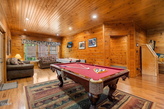 rec room with light wood-type flooring, wooden walls, wooden ceiling, and pool table