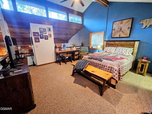 carpeted bedroom with ceiling fan, beam ceiling, and high vaulted ceiling