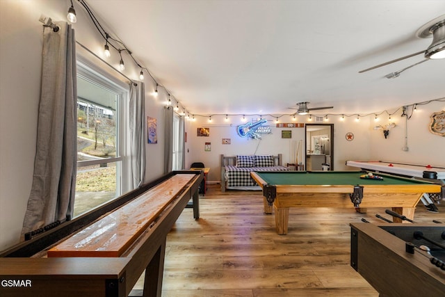 recreation room featuring wood-type flooring, pool table, and ceiling fan