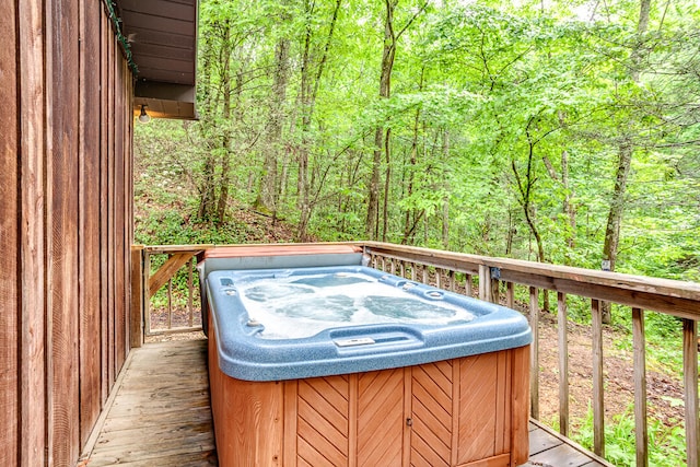 deck with a hot tub