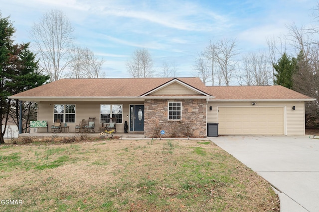 ranch-style house with stone siding, a porch, a front lawn, and an attached garage