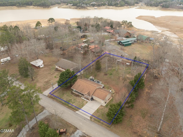 bird's eye view with a water view