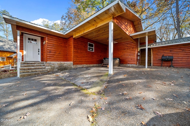 exterior space featuring a carport