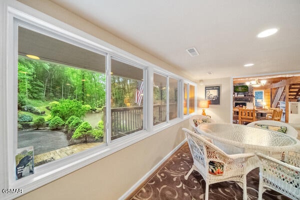 sunroom / solarium with visible vents