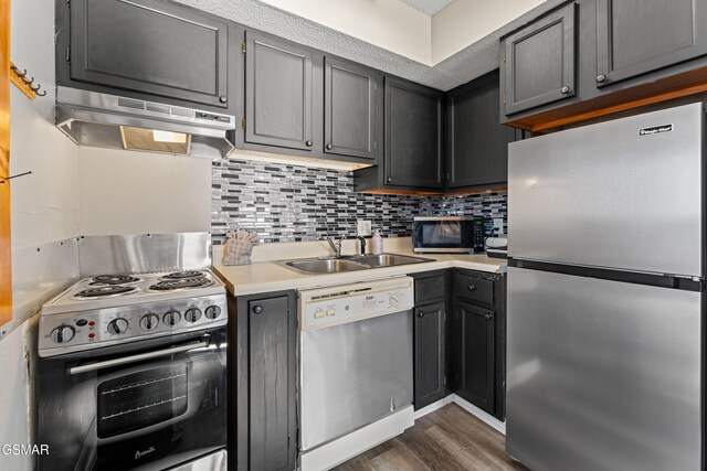 1260 Ski View Dr Unit 3308, Gatlinburg, TN 37738 - kitchen featuring stainless steel appliances, light countertops, backsplash, a sink, and under cabinet range hood