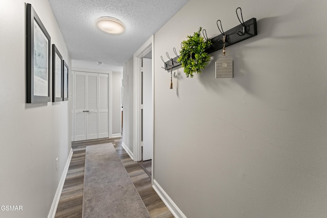 1260 Ski View Dr Unit 3308, Gatlinburg, TN 37738 - hallway with dark wood-style floors, baseboards, and a textured ceiling