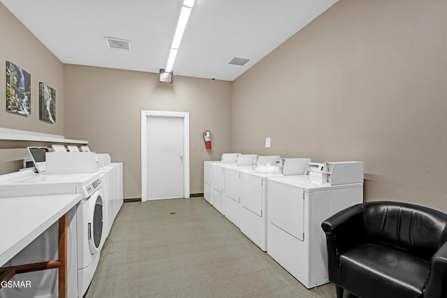 laundry room with independent washer and dryer