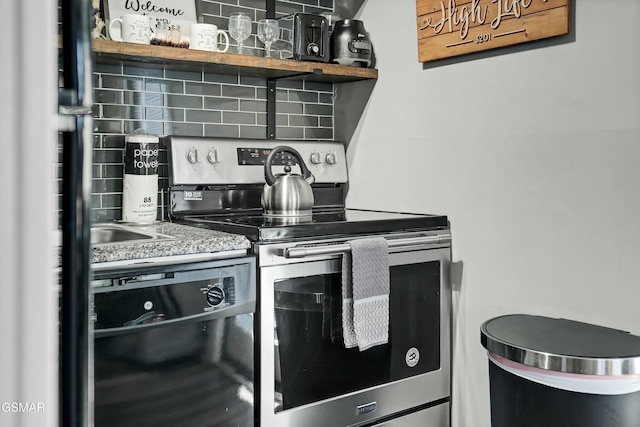 kitchen with tasteful backsplash, stainless steel range with electric cooktop, and black dishwasher