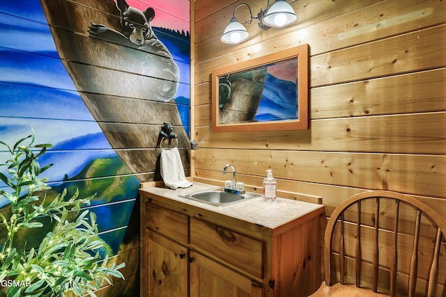 612 Cherry Blossom Way, Pigeon Forge, TN 37863 - bathroom featuring wood walls and vanity