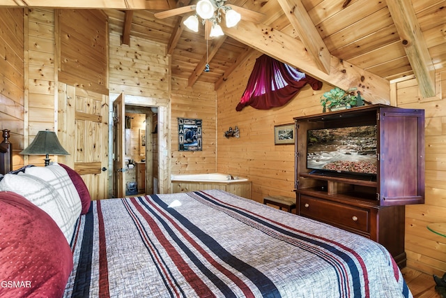 612 Cherry Blossom Way, Pigeon Forge, TN 37863 - bedroom with lofted ceiling with beams, wood walls, and wooden ceiling
