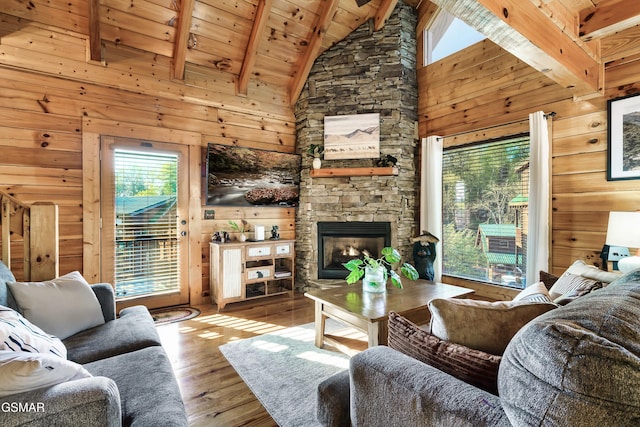 612 Cherry Blossom Way, Pigeon Forge, TN 37863 - living room featuring wooden walls, a wealth of natural light, and wood ceiling