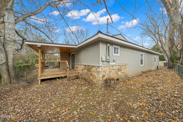 exterior space featuring a wooden deck