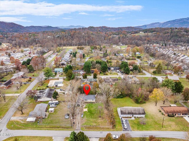 drone / aerial view featuring a mountain view