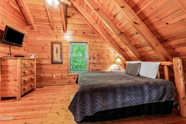 bedroom featuring wooden ceiling, wood-type flooring, and wooden walls