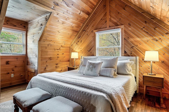 bedroom with multiple windows, wooden walls, lofted ceiling, wood finished floors, and wood ceiling