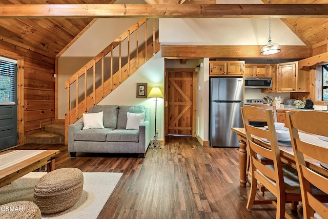 living area featuring wooden ceiling, dark wood-type flooring, stairway, and wooden walls