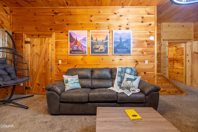 living area featuring wood walls, wooden ceiling, and carpet flooring