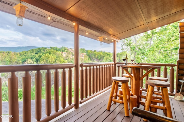 deck featuring a wooded view